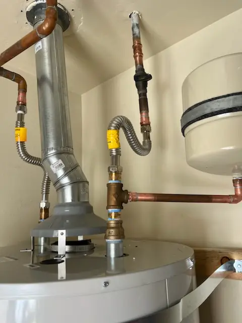 Water heater installation and plumbing repair in Cole